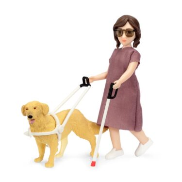 LUNDBY kona með blindrastaf og hund